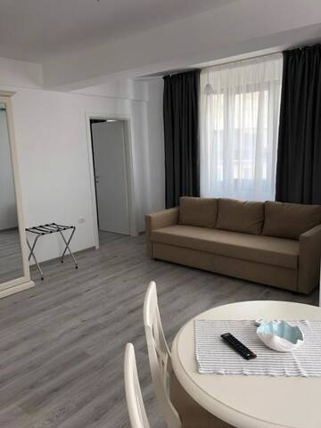 Фото номера Апартаменты с 1 спальней Отели типа «постель и завтрак» Apartments Excelsior Mamaia Nord г. Мамайя Норд – Нэводари 11