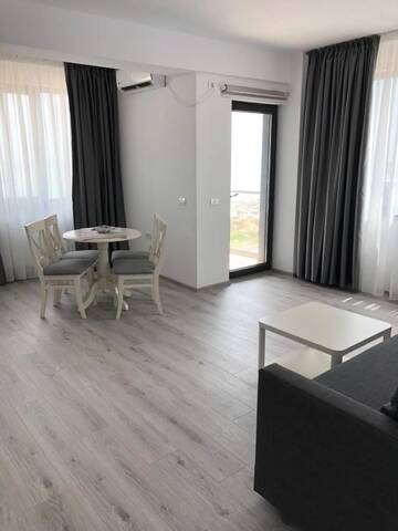 Фото номера Апартаменты с 1 спальней Отели типа «постель и завтрак» Apartments Excelsior Mamaia Nord г. Мамайя Норд – Нэводари 17