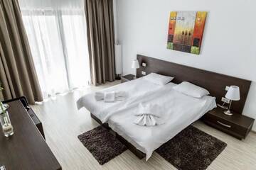 Фото номера Номер Делюкс с кроватью размера «king-size» Гостевой дом MRC RESORT Mamaia Nord г. Мамайя Норд – Нэводари 21